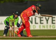 1 September 2021; Ryan Burl of Zimbabwe during match three of the Dafanews T20 series between Ireland and Zimbabwe at Bready Cricket Club in Magheramason, Tyrone. Photo by Harry Murphy/Sportsfile