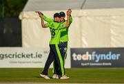 1 September 2021; Shane Getkate of Ireland, left, celebrates the winning wicket with Ben White during match three of the Dafanews T20 series between Ireland and Zimbabwe at Bready Cricket Club in Magheramason, Tyrone. Photo by Harry Murphy/Sportsfile
