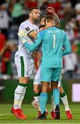 1 September 2021; Gavin Bazunu of Republic of Ireland is congratulated by team-mate Shane Duffy after saving a penalty from Portugal's Cristiano Ronaldo during the FIFA World Cup 2022 qualifying group A match between Portugal and Republic of Ireland at Estádio Algarve in Faro, Portugal. Photo by Seb Daly/Sportsfile
