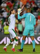 1 September 2021; Gavin Bazunu of Republic of Ireland is congratulated by team-mate Jeff Hendrick after saving a penalty from Portugal's Cristiano Ronaldo during the FIFA World Cup 2022 qualifying group A match between Portugal and Republic of Ireland at Estádio Algarve in Faro, Portugal. Photo by Seb Daly/Sportsfile