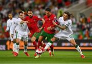 1 September 2021; Cristiano Ronaldo of Portugal in action against Jeff Hendrick of Republic of Ireland during the FIFA World Cup 2022 qualifying group A match between Portugal and Republic of Ireland at Estádio Algarve in Faro, Portugal. Photo by Seb Daly/Sportsfile