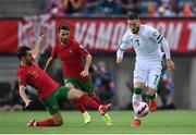1 September 2021; Matt Doherty of Republic of Ireland in action against Bernardo Silva, left, and Rafa Silva of Portugal during the FIFA World Cup 2022 qualifying group A match between Portugal and Republic of Ireland at Estádio Algarve in Faro, Portugal. Photo by Stephen McCarthy/Sportsfile