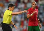 1 September 2021; Referee Matej Jug and Pepe of Portugal during the FIFA World Cup 2022 qualifying group A match between Portugal and Republic of Ireland at Estádio Algarve in Faro, Portugal. Photo by Stephen McCarthy/Sportsfile