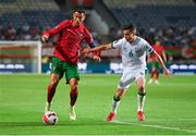 1 September 2021; Cristiano Ronaldo of Portugal in action against Josh Cullen of Republic of Ireland during the FIFA World Cup 2022 qualifying group A match between Portugal and Republic of Ireland at Estádio Algarve in Faro, Portugal. Photo by Seb Daly/Sportsfile