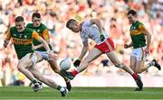 28 August 2021; Ben McDonnell of Tyrone in action against Kerry players, from left, Jason Foley, Gavin White and Jack Barry of Kerry during the GAA Football All-Ireland Senior Championship semi-final match between Kerry and Tyrone at Croke Park in Dublin. Photo by Brendan Moran/Sportsfile
