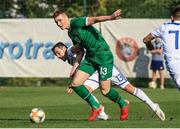 3 September 2021; Jake O'Brien of Republic of Ireland in action against Ivan Bašic of Bosnia & Herzegovina during the UEFA European U21 Championship Qualifier match between Bosnia & Herzegovina and Republic of Ireland at FF BH Football Training Centre in Zenica, Bosnia. Photo by Fedja Krvavac/Sportsfile