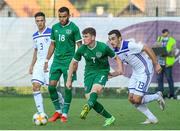 3 September 2021; Gavin Kilkenny of Republic of Ireland in action against Ivan Bašic of Bosnia & Herzegovina during the UEFA European U21 Championship Qualifier match between Bosnia & Herzegovina and Republic of Ireland at FF BH Football Training Centre in Zenica, Bosnia. Photo by Fedja Krvavac/Sportsfile