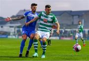 3 September 2021; Aaron Greene of Shamrock Rovers in action against Adam Foley of Finn Harps during the SSE Airtricity League Premier Division match between Finn Harps and Shamrock Rovers at Finn Park in Ballybofey, Donegal. Photo by Ben McShane/Sportsfile