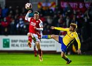 3 September 2021; Chris Forrester of St Patrick's Athletic in action against Aodh Dervin of Longford Town during the SSE Airtricity League Premier Division match between St Patrick's Athletic and Longford Town at Richmond Park in Dublin. Photo by Eóin Noonan/Sportsfile