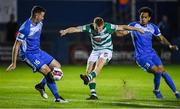 3 September 2021; Rory Gaffney of Shamrock Rovers has a shot on goal despite the attention of Shane McEleney, left, and Will Seymore of Finn Harps during the SSE Airtricity League Premier Division match between Finn Harps and Shamrock Rovers at Finn Park in Ballybofey, Donegal. Photo by Ben McShane/Sportsfile