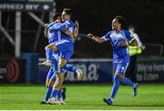 3 September 2021; Jordan Mustoe of Finn Harps celebrates with team-mate Kosovar Sadiki, left, and Will Seymore, right, after scoring his side's first goal during the SSE Airtricity League Premier Division match between Finn Harps and Shamrock Rovers at Finn Park in Ballybofey, Donegal. Photo by Ben McShane/Sportsfile