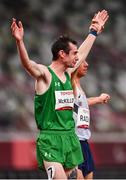 4 September 2021; Michael McKillop of Ireland has his hands held aloft by Louis Radius of France after competing in the Men's T38 1500 metre final at the Olympic Stadium on day eleven during the Tokyo 2020 Paralympic Games in Tokyo, Japan. Photo by Sam Barnes/Sportsfile