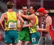 4 September 2021; Michael McKillop of Ireland, centre, is consoled by competitors after competing in the Men's T38 1500 metre final at the Olympic Stadium on day eleven during the Tokyo 2020 Paralympic Games in Tokyo, Japan. Photo by Sam Barnes/Sportsfile