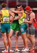 4 September 2021; Michael McKillop of Ireland, centre, is consoled by competitors after competing in the Men's T38 1500 metre final at the Olympic Stadium on day eleven during the Tokyo 2020 Paralympic Games in Tokyo, Japan. Photo by Sam Barnes/Sportsfile