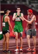 4 September 2021; Michael McKillop of Ireland, centre, is consoled by competitors Abdelkrim Kai of Algeria, left, and Liam Stanley of Canada after competing in the Men's T38 1500 metre final at the Olympic Stadium on day eleven during the Tokyo 2020 Paralympic Games in Tokyo, Japan. Photo by Sam Barnes/Sportsfile
