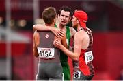 4 September 2021; Michael McKillop of Ireland, centre, is consoled by competitors Nate Riech, left, and Liam Stanley of Canada after competing in the Men's T38 1500 metre final at the Olympic Stadium on day eleven during the Tokyo 2020 Paralympic Games in Tokyo, Japan. Photo by Sam Barnes/Sportsfile