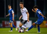 3 September 2021; Cameron Dummigan of Dundalk in action against Phoenix Patterson of Waterford during the SSE Airtricity League Premier Division match between Waterford and Dundalk at the RSC in Waterford. Photo by Piaras Ó Mídheach/Sportsfile