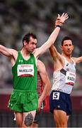 4 September 2021; Michael McKillop of Ireland has his hands held aloft by Louis Radius of France after competing in the Men's T38 1500 metre final at the Olympic Stadium on day eleven during the Tokyo 2020 Paralympic Games in Tokyo, Japan. Photo by Sam Barnes/Sportsfile