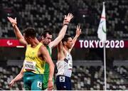 4 September 2021; Michael McKillop of Ireland, second left, has his hands held aloft by Louis Radius of France after competing in the Men's T38 1500 metre final at the Olympic Stadium on day eleven during the Tokyo 2020 Paralympic Games in Tokyo, Japan. Photo by Sam Barnes/Sportsfile