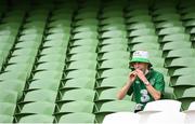 4 September 2021; A Republic of Ireland supporter enjoys a hotdog before the FIFA World Cup 2022 qualifying group A match between Republic of Ireland and Azerbaijan at the Aviva Stadium in Dublin. Photo by Stephen McCarthy/Sportsfile