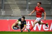 4 September 2021; Calvin Nash of Munster Grey XV scores a try despite the efforts of Ben Healy of Munster Red XV during a challenge match between Munster XV Red and Munster XV Grey at Thomond Park in Limerick. Photo by Brendan Moran/Sportsfile