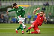 4 September 2021; Aaron Connolly of Republic of Ireland in action against Maksim Medvedev of Azerbaijan during the FIFA World Cup 2022 qualifying group A match between Republic of Ireland and Azerbaijan at the Aviva Stadium in Dublin. Photo by Seb Daly/Sportsfile