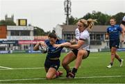 4 September 2021; Niamh Byrne of Leinster scores her side's fifth try despite the tackle of Fern Wilson of Ulster during the IRFU Women's Interprovincial Championship Round 2 match between Leinster and Ulster at Energia Park in Dublin. Photo by Harry Murphy/Sportsfile