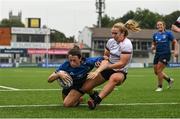 4 September 2021; Niamh Byrne of Leinster scores her side's fifth try despite the tackle of Fern Wilson of Ulster during the IRFU Women's Interprovincial Championship Round 2 match between Leinster and Ulster at Energia Park in Dublin. Photo by Harry Murphy/Sportsfile