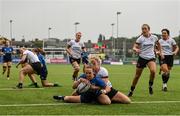4 September 2021; Michelle Claffey of Leinster scores her side's seventh try despite the tackle of Toni Macartney of Ulster during the IRFU Women's Interprovincial Championship Round 2 match between Leinster and Ulster at Energia Park in Dublin. Photo by Harry Murphy/Sportsfile