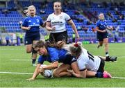 4 September 2021; Ella Roberts of Leinster scores a try under pressure from Toni Macartney of Ulster during the IRFU Women's Interprovincial Championship Round 2 match between Leinster and Ulster at Energia Park in Dublin. Photo by Piaras Ó Mídheach/Sportsfile
