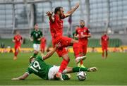 4 September 2021; Elvin Badalov of Azerbaijan is tackled by James Collins of Republic of Ireland during the FIFA World Cup 2022 qualifying group A match between Republic of Ireland and Azerbaijan at the Aviva Stadium in Dublin. Photo by Seb Daly/Sportsfile