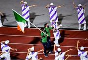 5 September 2021; Team Ireland flag bearers Katie George Dunlevy, left, and Eve McCrystal, carry the Irish Tri-Colour during the closing ceremony at the Olympic Stadium on day twelve during the Tokyo 2020 Paralympic Games in Tokyo, Japan. Photo by Sam Barnes/Sportsfile
