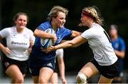 5 September 2021; Aoife Dalton of Leinster is tackled by Jana McQuillan of Ulster during the IRFU U18 Women's Interprovincial Championship Round 2 match between Leinster and Ulster at Templeville Road in Dublin. Photo by Ramsey Cardy/Sportsfile