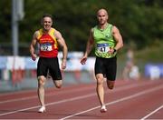 5 September 2021; Anthony Browne of An Ríocht AC, right, and Glen Scullion of Mid Ulster AC competing in the M40 200 metres during the Irish Life Health National Masters Track and Field Championships at Morton Stadium in Santry, Dublin. Photo by Seb Daly/Sportsfile