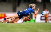 5 September 2021; Aoife Dalton of Leinster is tackled by Lucy Thompson of Ulster during the IRFU U18 Women's Interprovincial Championship Round 2 match between Leinster and Ulster at Templeville Road in Dublin. Photo by Ramsey Cardy/Sportsfile