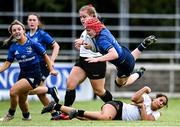 5 September 2021; Aoife Wafer of Leinster evades the tackle of Sarah Shreshta of Ulster during the IRFU U18 Women's Interprovincial Championship Round 2 match between Leinster and Ulster at Templeville Road in Dublin. Photo by Ramsey Cardy/Sportsfile