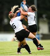 5 September 2021; Mia Kelly of Leinster in action against Sarah Roberts, left, and Sophie Meeke of Ulster during the IRFU U18 Women's Interprovincial Championship Round 2 match between Leinster and Ulster at Templeville Road in Dublin. Photo by Ramsey Cardy/Sportsfile