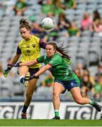 5 September 2021; Aisling Murphy of Wexford in action against Niamh Spellman of Westmeath during the TG4 All-Ireland Ladies Intermediate Football Championship Final match between Westmeath and Wexford at Croke Park in Dublin. Photo by Eóin Noonan/Sportsfile