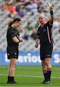 5 September 2021; Wexford goalkeeper Sarah Merrigan is shown a yellow card by referee Shane Curley during the TG4 All-Ireland Ladies Intermediate Football Championship Final match between Westmeath and Wexford at Croke Park in Dublin. Photo by Brendan Moran/Sportsfile