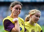 5 September 2021; Wexford players Chloe Dwyer, left, and Evelyn Deans dejected after their side's defeat during the TG4 All-Ireland Ladies Intermediate Football Championship Final match between Westmeath and Wexford at Croke Park in Dublin. Photo by Piaras Ó Mídheach/Sportsfile