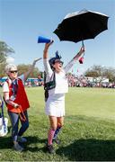 5 September 2021; Grace Lee, mother of Danielle Kang of Team USA, celebrates her daughter winning her match on the 18th green during the morning foursomes on day two of the Solheim Cup at the Inverness Club in Toledo, Ohio, USA. Photo by Brian Spurlock/Sportsfile
