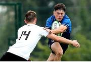 4 September 2021; Tom Hodgkinson of Leinster is tackled by Zach Scarlett of Ulster during the IRFU U18 Men's Clubs Interprovincial Championship Round 3 match between Ulster and Leinster at Newforge in Belfast. Photo by John Dickson/Sportsfile