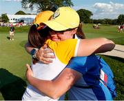 5 September 2021; Leona Maguire of Team Europe embraces her twin sister Lisa Maguire after finishing her match on the 18th green during the afternoon fourballs on day two of the Solheim Cup at the Inverness Club in Toledo, Ohio, USA. Photo by Brian Spurlock/Sportsfile