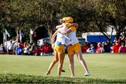 5 September 2021; Mel Reid of Team Europe embraces team-mate Leona Maguire after making a birdie putt on the 18th green during the afternoon fourballs match against Lizette Salas and Jennifer Kupcho of Team USA on day two of the Solheim Cup at the Inverness Club in Toledo, Ohio, USA. Photo by Brian Spurlock/Sportsfile