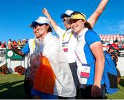6 September 2021; Leona Maguire of Team Europe, left, poses for a photo with her twin sister Lisa and with the Solheim Cup after winning on day three of the Solheim Cup at the Inverness Club in Toledo, Ohio, USA. Photo by Brian Spurlock/Sportsfile