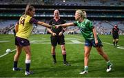 5 September 2021; Referee Shane Curley with Wexford captain Aisling Murphy and Westmeath captain Fiona Claffey before the TG4 All-Ireland Ladies Intermediate Football Championship Final match between Westmeath and Wexford at Croke Park in Dublin. Photo by Stephen McCarthy/Sportsfile