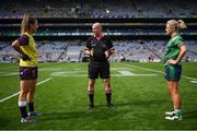 5 September 2021; Referee Shane Curley with Wexford captain Aisling Murphy and Westmeath captain Fiona Claffey before the TG4 All-Ireland Ladies Intermediate Football Championship Final match between Westmeath and Wexford at Croke Park in Dublin. Photo by Stephen McCarthy/Sportsfile