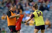 5 September 2021; Aisling Murphy of Wexford is given a bib in order to take over as goalkeeper during the TG4 All-Ireland Ladies Intermediate Football Championship Final match between Westmeath and Wexford at Croke Park in Dublin. Photo by Stephen McCarthy/Sportsfile