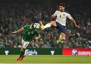 7 September 2021; John Egan of Republic of Ireland in action against Aleksandar Mitrovic of Serbia during the FIFA World Cup 2022 qualifying group A match between Republic of Ireland and Serbia at the Aviva Stadium in Dublin. Photo by Harry Murphy/Sportsfile