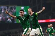 7 September 2021; John Egan and Shane Duffy of Republic of Ireland celebrate their side's first goal, an own goal scored by Nikola Milenkovic of Serbia, during the FIFA World Cup 2022 qualifying group A match between Republic of Ireland and Serbia at the Aviva Stadium in Dublin. Photo by Stephen McCarthy/Sportsfile